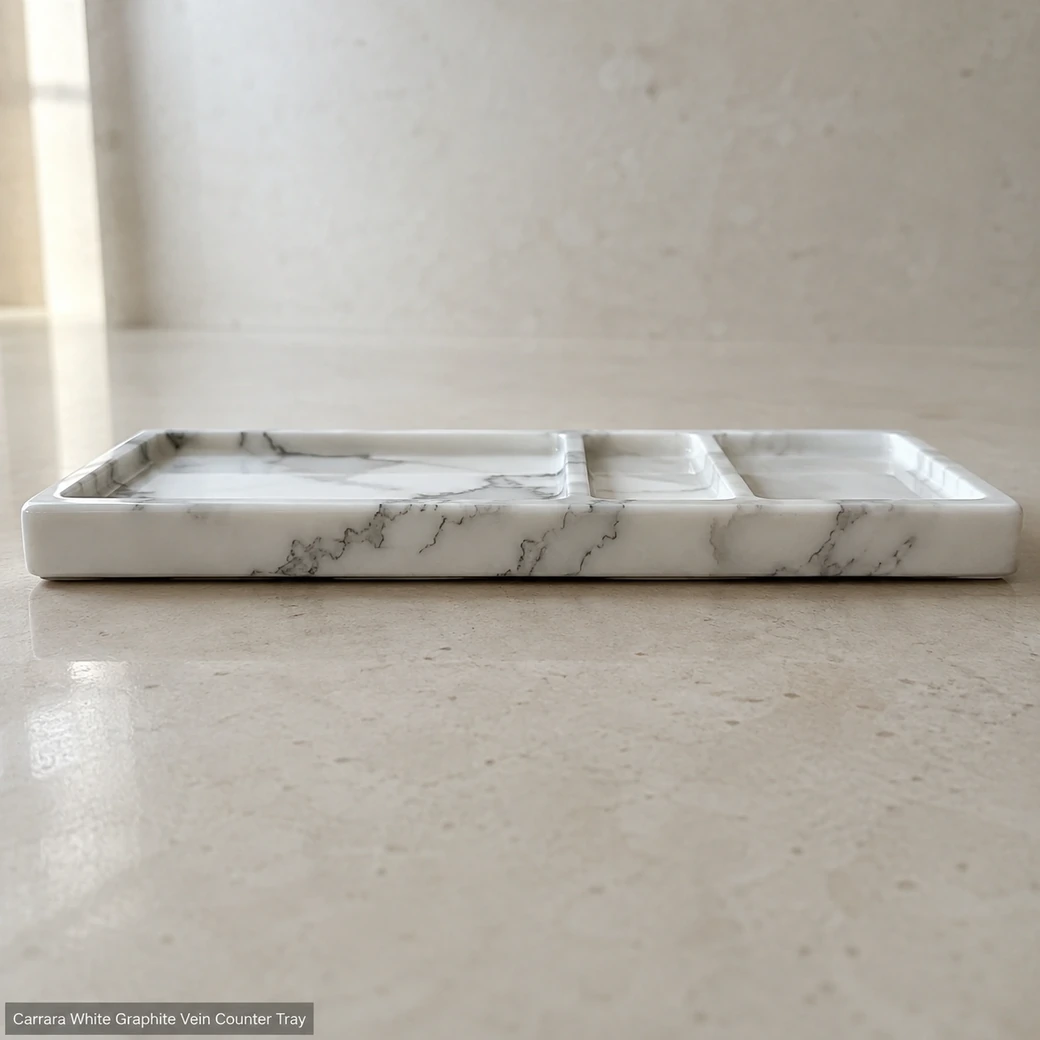 Low side-profile Italian marble organizer on pale limestone, emphasizing dark grey veins, glossy edge and 1.8 cm height.