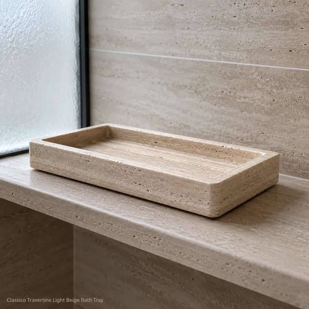 Light beige travertine bath tray on floating shelf, low side view showing satin texture and linear stone bands.
