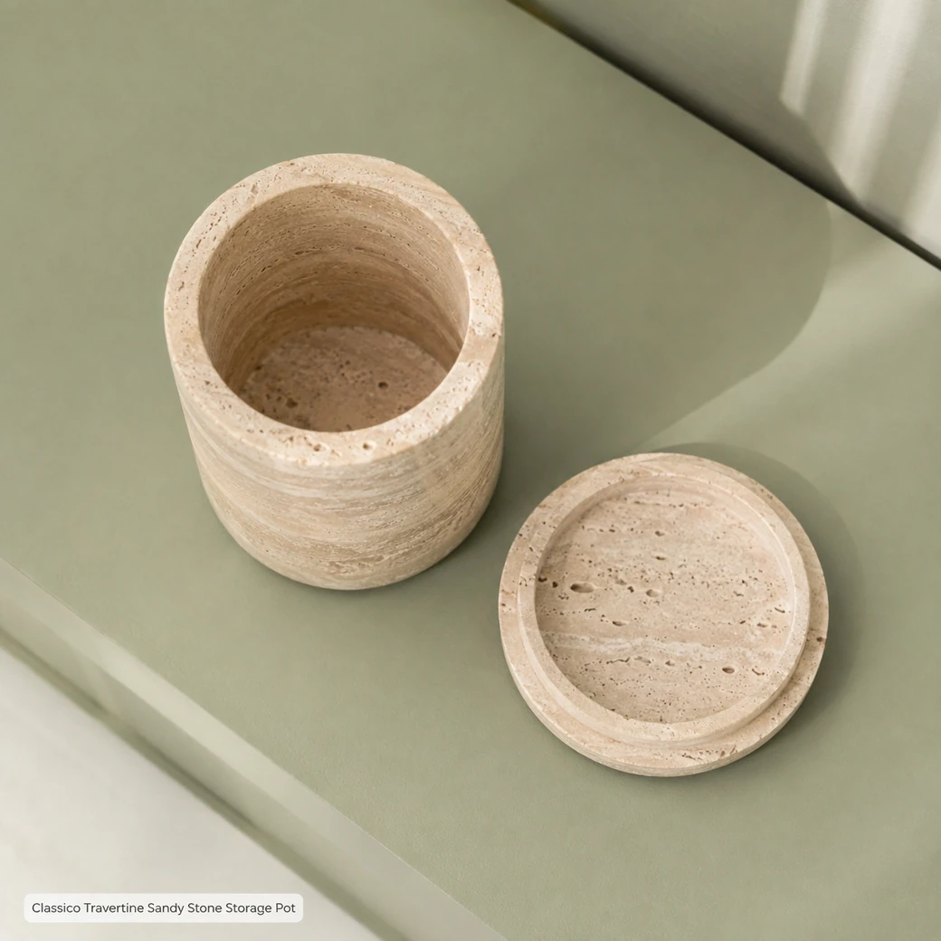Open sandy travertine storage jar viewed from above, with lid beside it and cream banding around the circular interior.