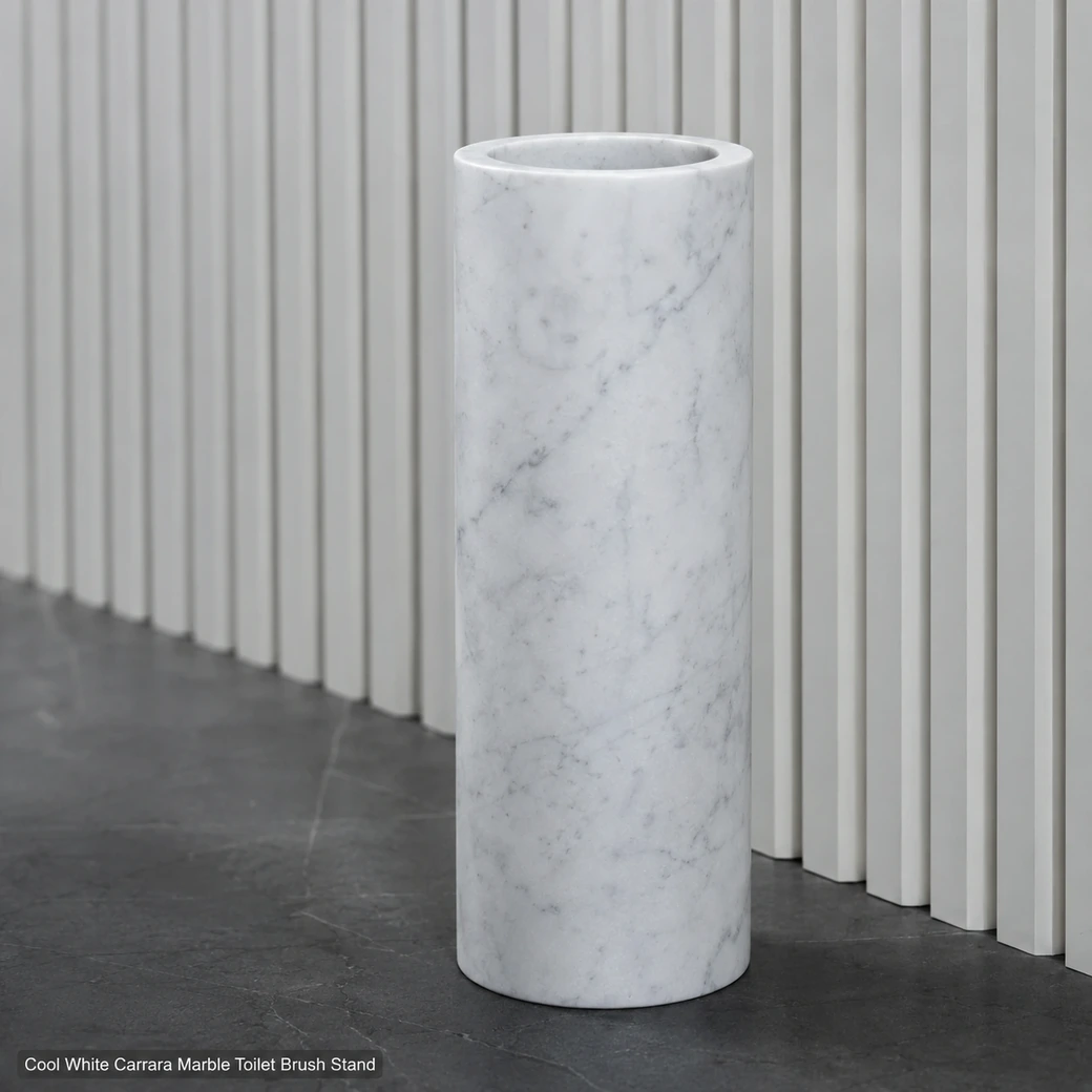 Cool white Carrara toilet brush stand on charcoal floor, low side view showing fine veins and brushed matte cylinder.
