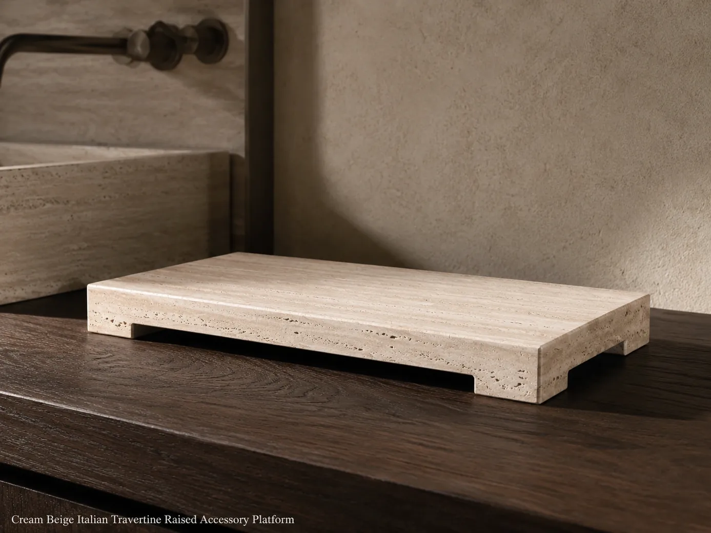 Low front view of cream beige travertine accessory platform on oak, showing raised form, filled pores and honed bands.