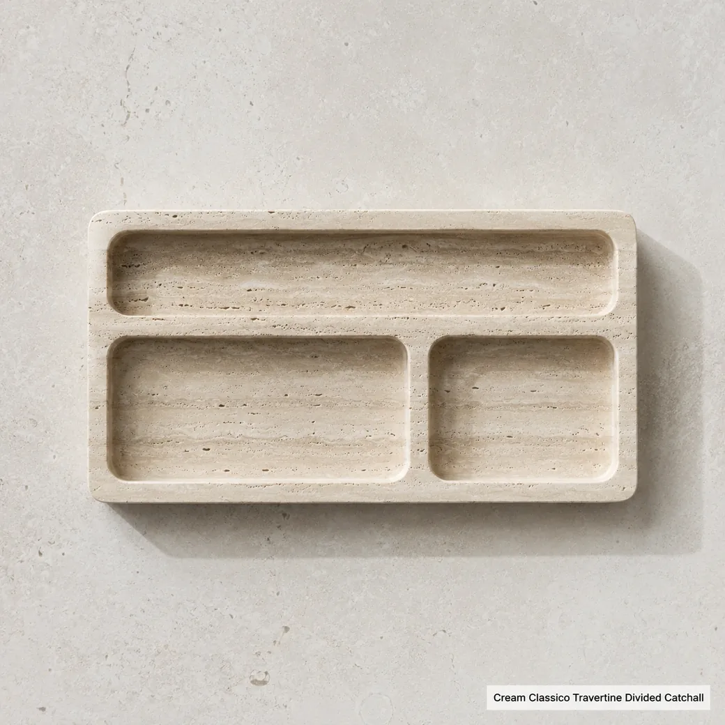 Overhead Classico Travertine organizer on limestone with cream-beige compartments and linear banding.