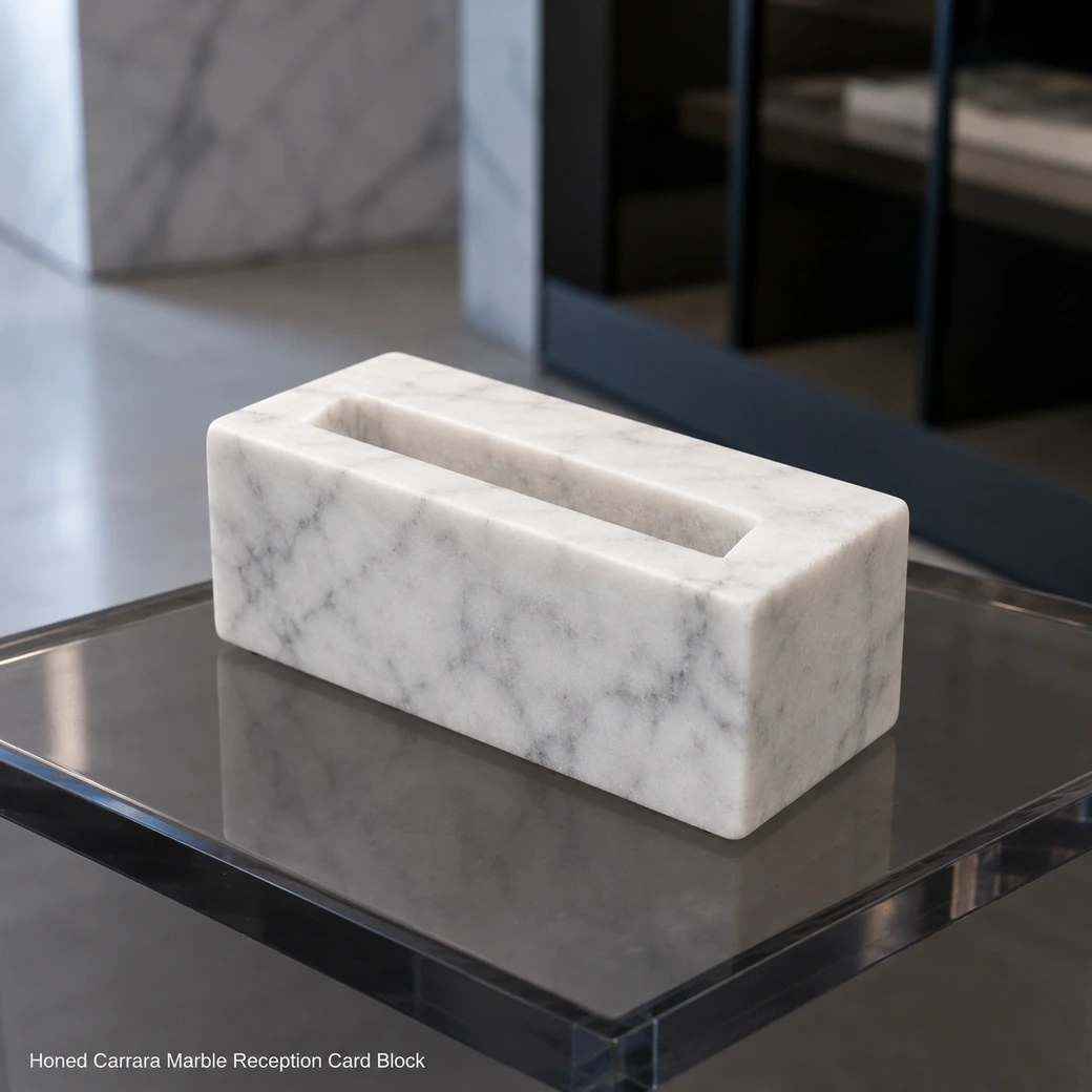 High macro Carrara business card stand on smoked acrylic with soft grey veins and angled honed slot.