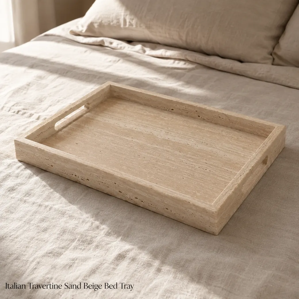 Italian Travertine bed tray in natural sand beige with raised edges, grip slots and brushed finish.
