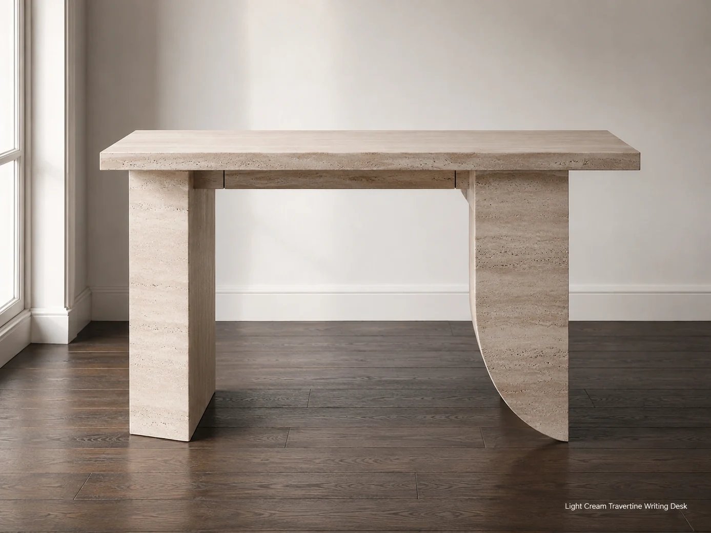 Light cream travertine writing desk in a gallery room, side elevation showing biscuit top and sculptural supports