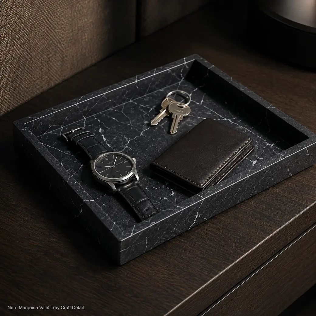 Leather-touch Nero Marquina valet tray with velvet-black stone, fine white veins and crafted recesses
