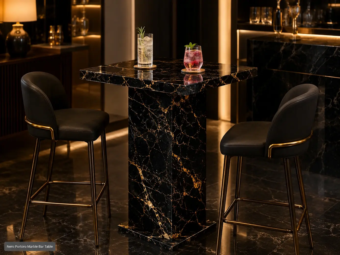 Polished Nero Portoro bar table with gold veining, bar stools and two cocktail glasses on coasters.