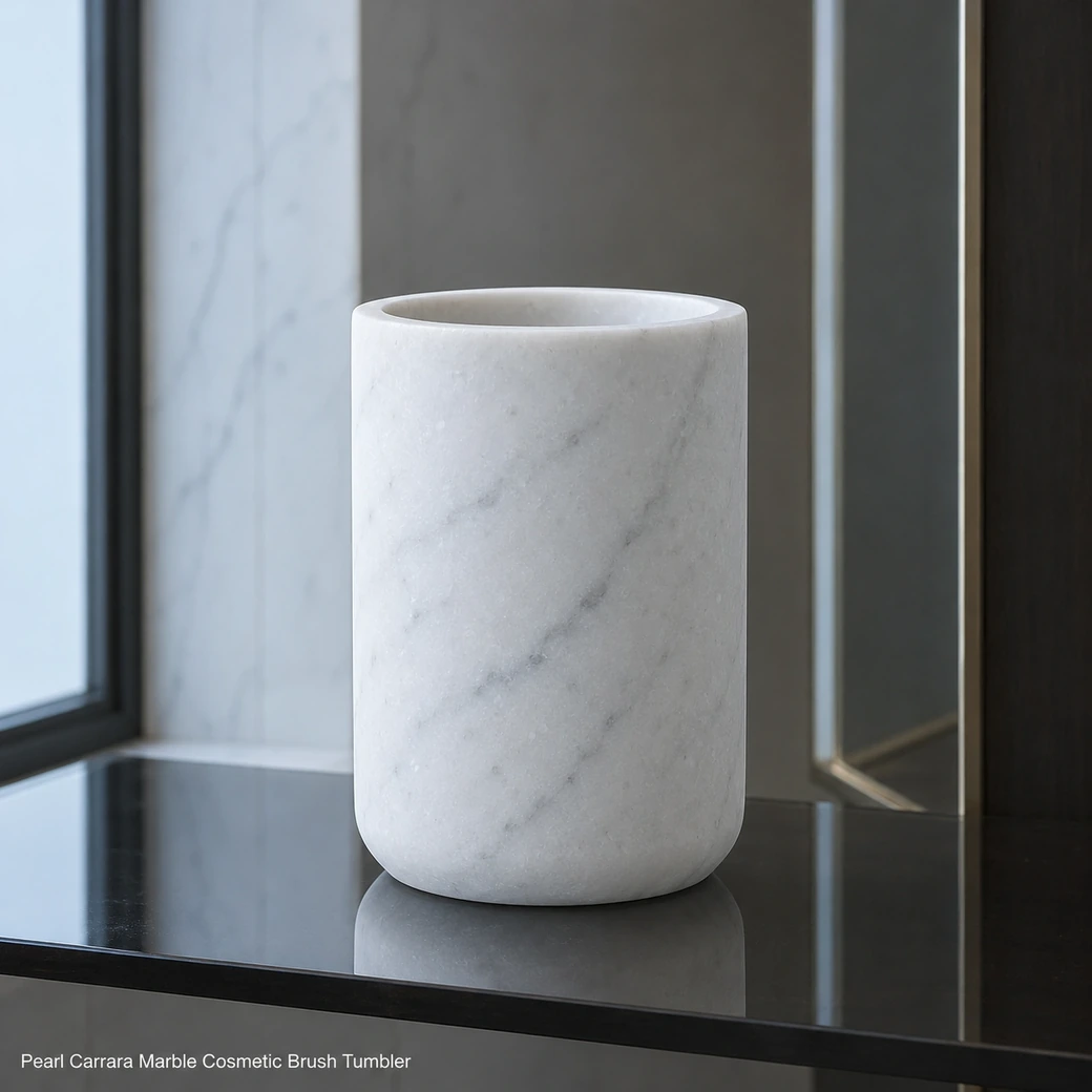 Pearl Carrara brush tumbler on smoked mirror, side view showing matte cylindrical form and subtle grey grain.