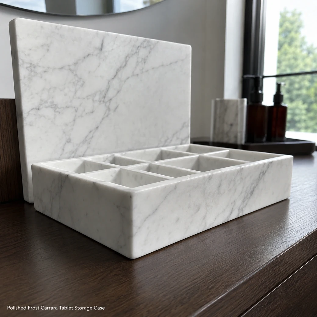 Frost Carrara medicine box at low side angle, lid upright behind open compartments with polished edge detail.