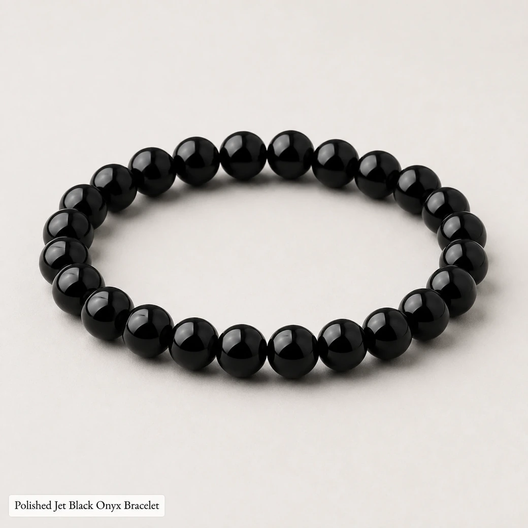 Polished jet black onyx bracelet with smooth round stone beads