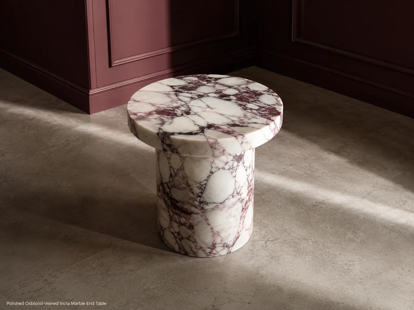 Polished oxblood-veined Viola end table viewed from above in a wine-coloured reading room