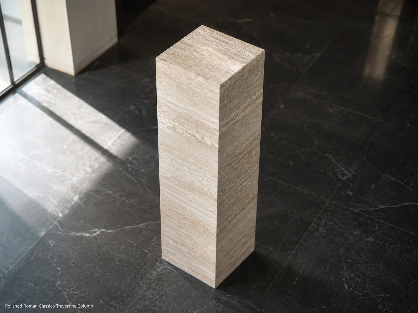 Polished Roman Classico travertine column in an atrium, high downward view showing top face and vertical bands