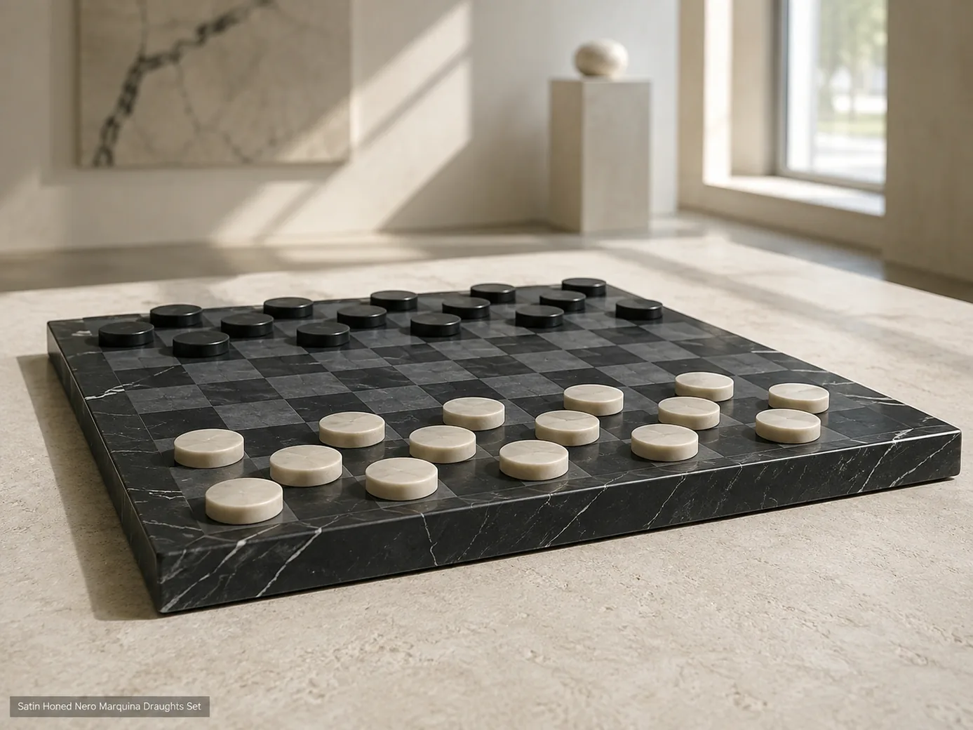 Nero Marquina draughts set viewed at board level on pale limestone in bright window light