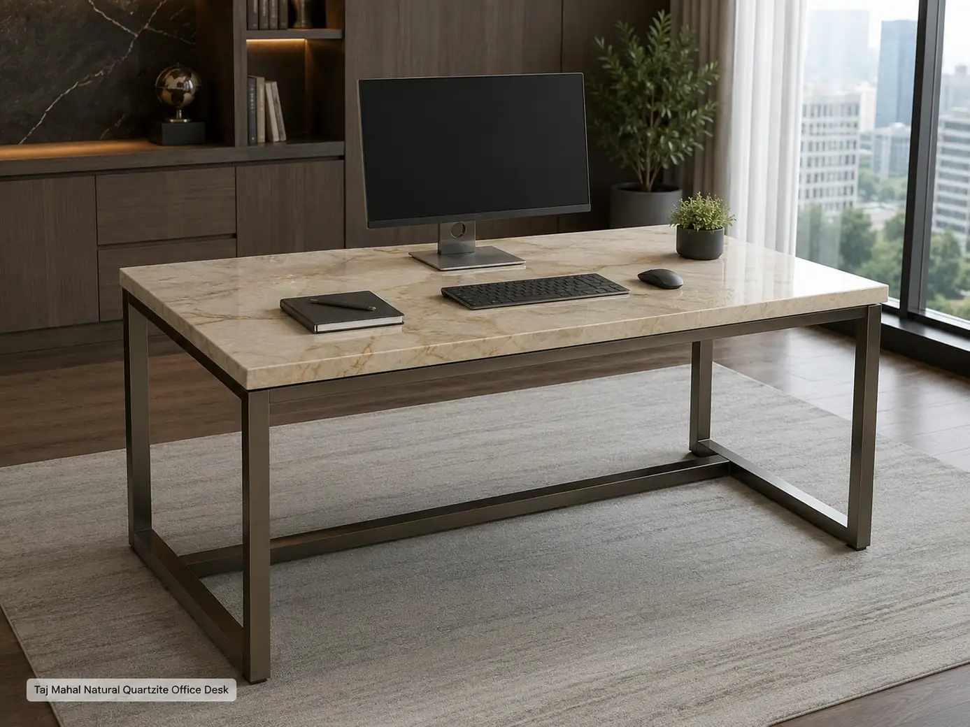 Honed Taj Mahal quartzite office desk with monitor, keyboard, notebook and discreet cable management.