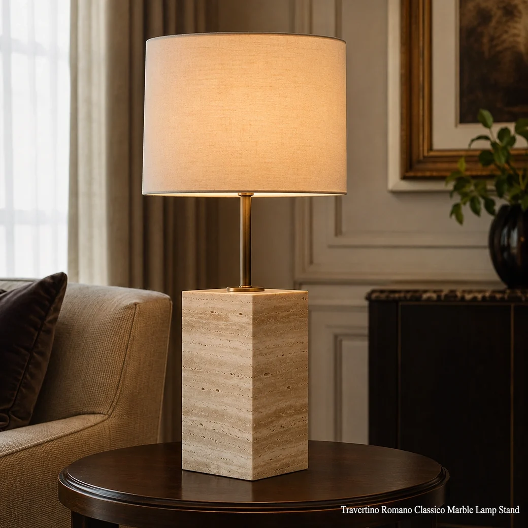 Brushed Travertino Romano lamp stand with weighted stone base, metal stem and proportionate lampshade.